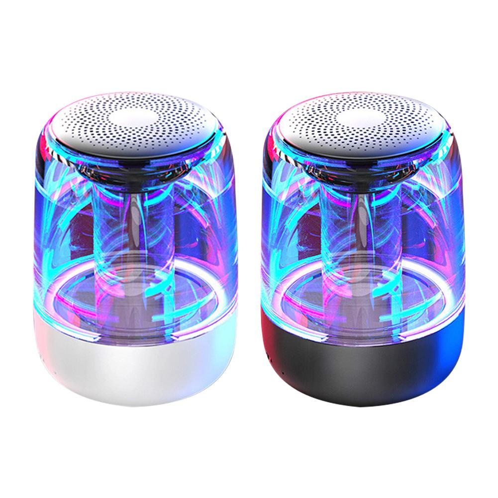 Two colorful LED light-up speakers on a white background