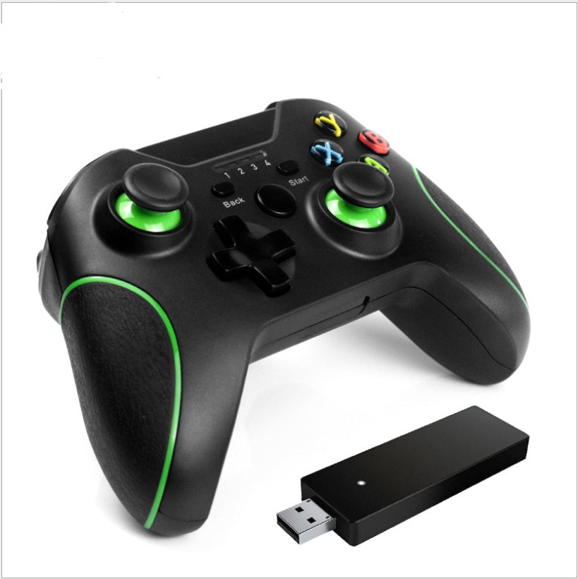 Black gaming controller with green accents and a USB receiver on a white background