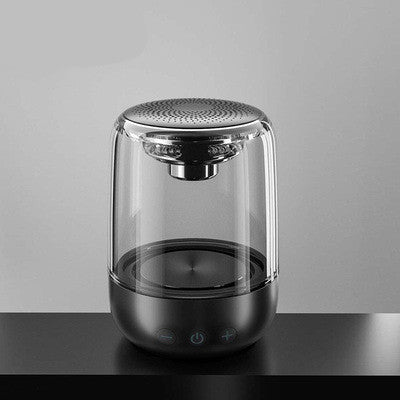 Modern glass and metal device on a gray background