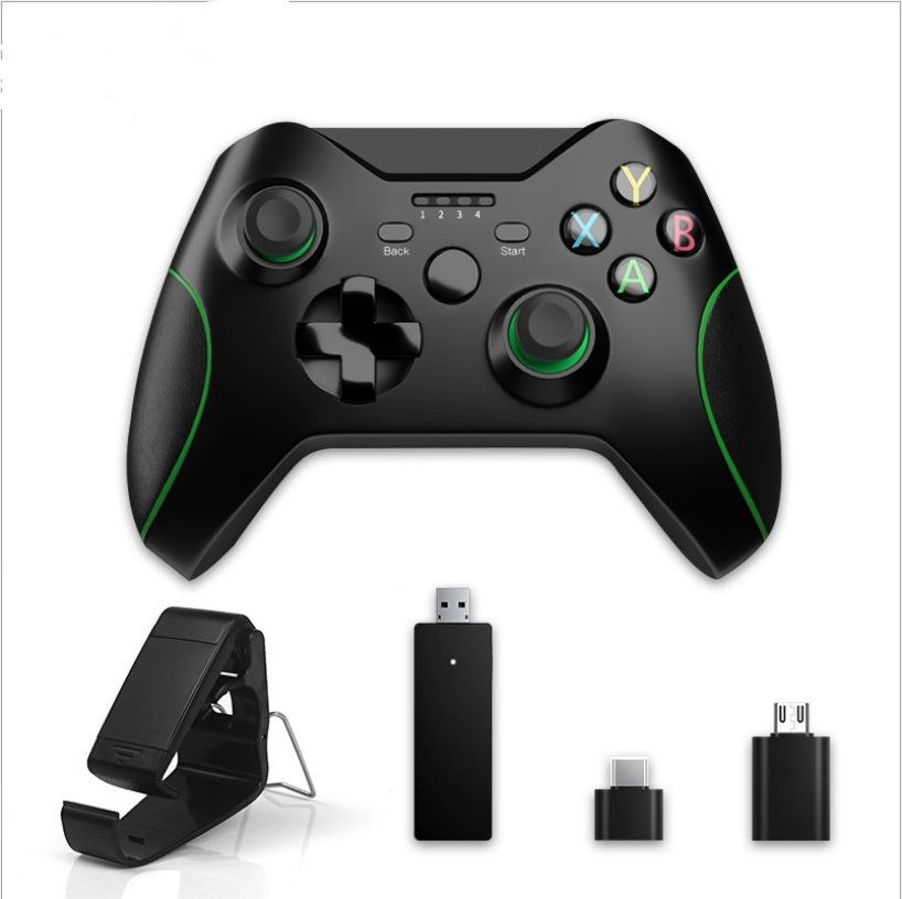 Black gaming controller with USB receiver and charging cable on a white background