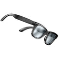 Black sunglasses with reflective lenses on a white background