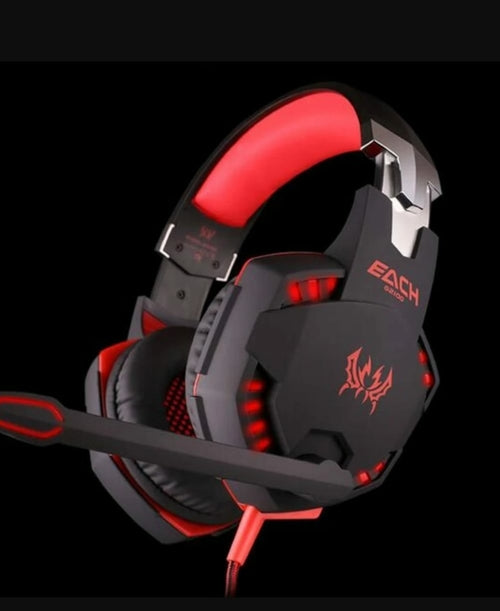 Black and red gaming headset with LED lights on a black background