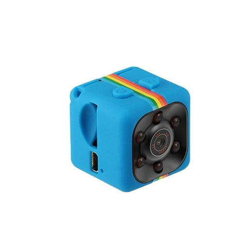 Small blue cube camera with colorful band on a white background