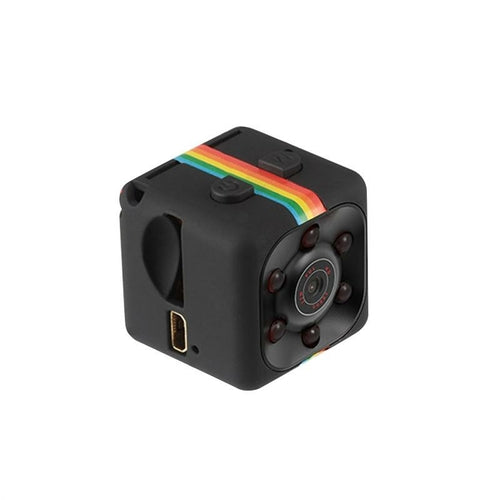 Small black camera with rainbow stripe on a white background
