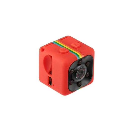 Small red cube-shaped camera with a white background