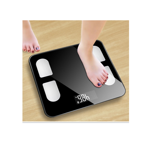 Person stepping on a digital bathroom scale with a clear background